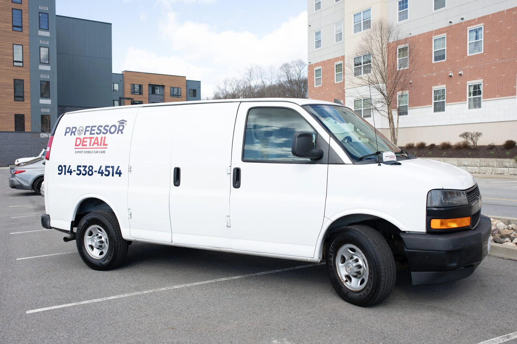 The full Professor Detail service van parked and ready for a job