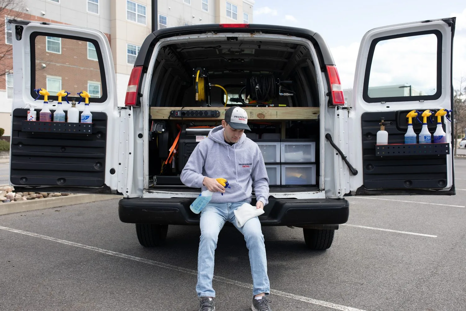 Peter Rossi preparing detailing supplies from the back of the Professor Detail van